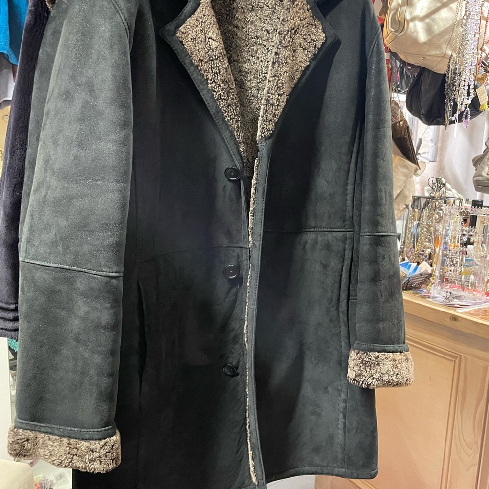 Leather men’s jacket, shearling lined. The twin to the female coat on my post.